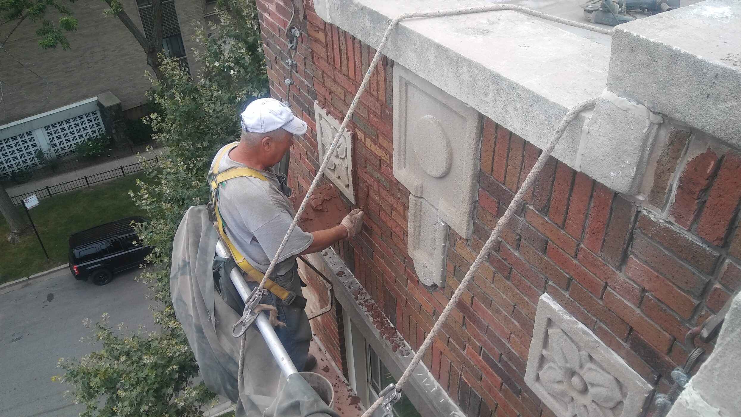 Restored Chicago brick and greystone facade by Casey Tuckpointing