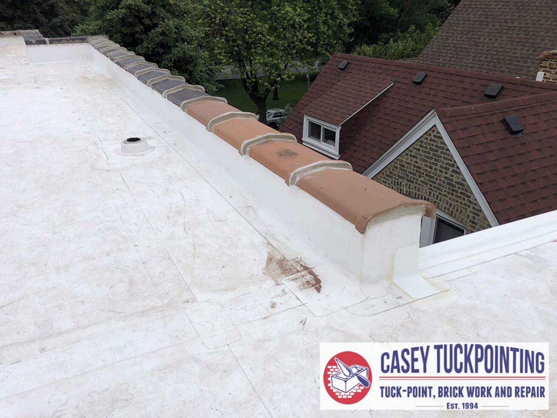 Parapet Repair - Before and After
